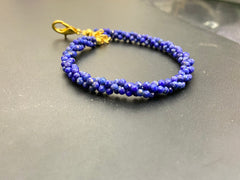 Handcrafted artisanal lapis lazuli beads twisted bracelets