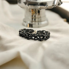 Handcrafted artisanal black spinal beads bracelet