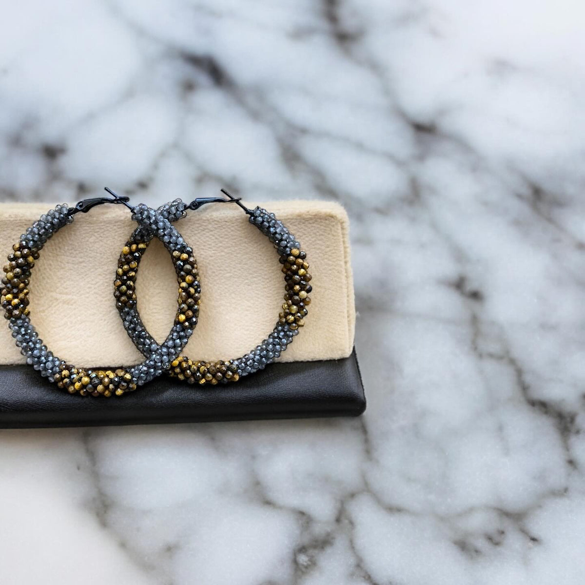 handcrafted artisanal tiger eye and black obsidian earrings