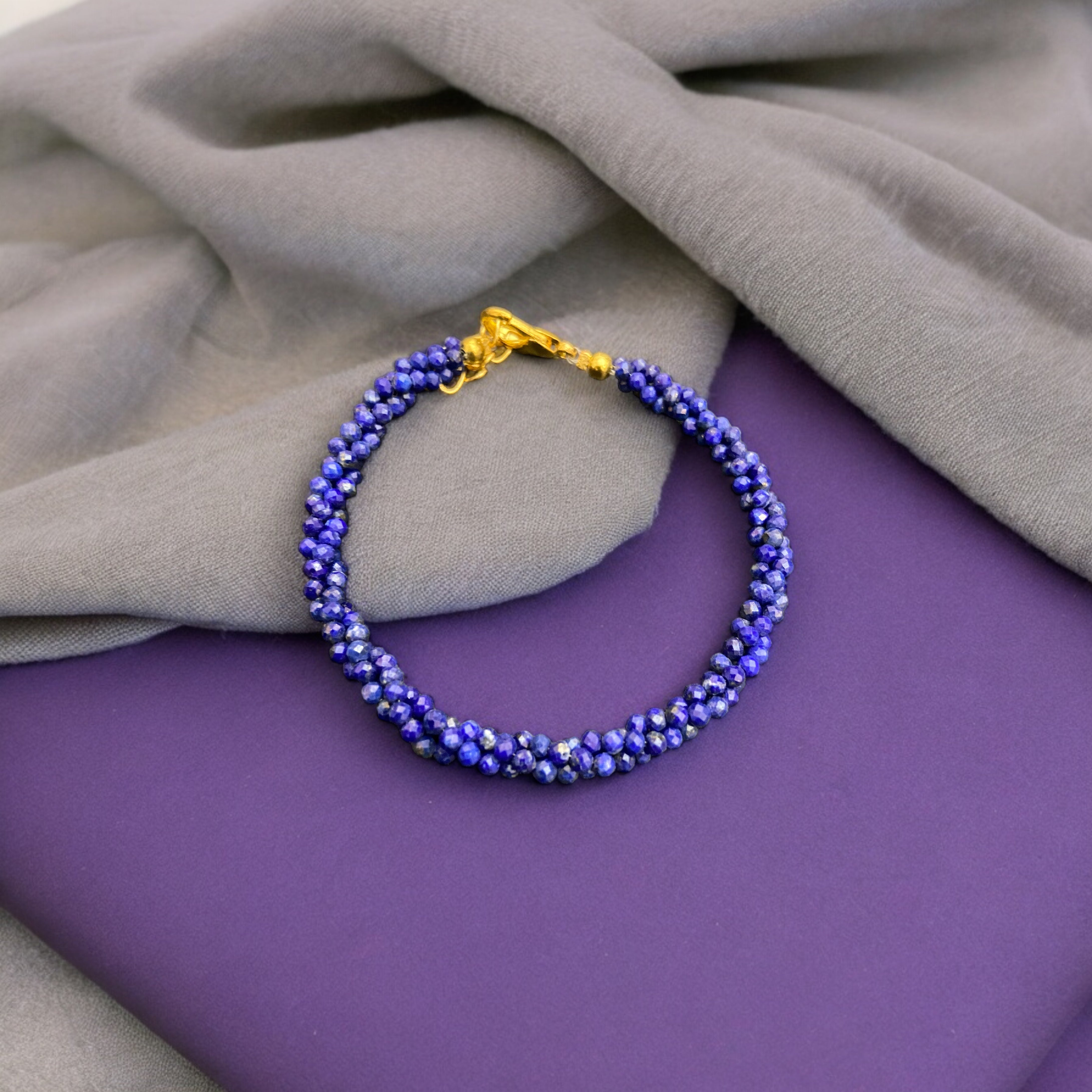 Handcrafted artisanal lapis lazuli beads twisted bracelets