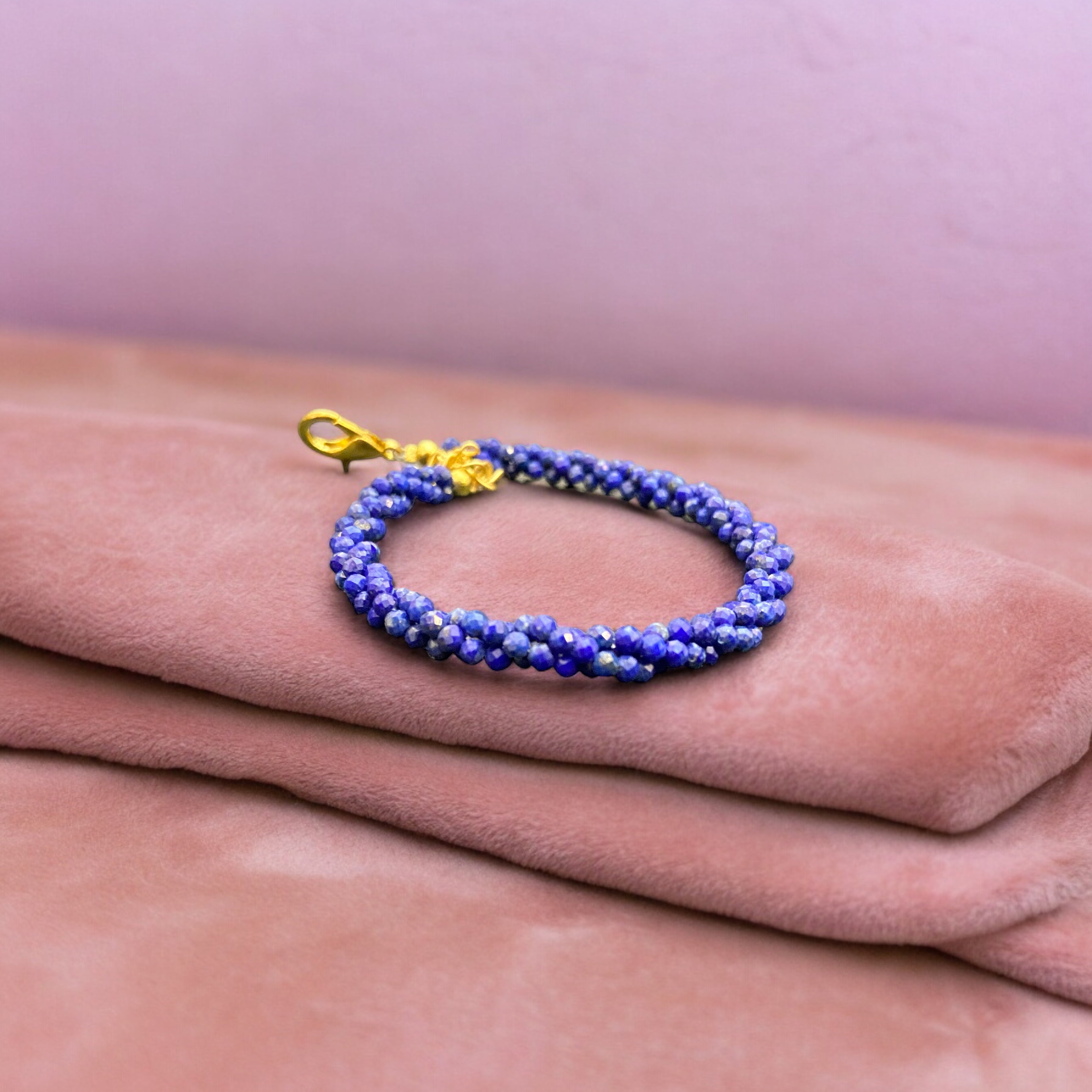 Handcrafted artisanal lapis lazuli beads twisted bracelets